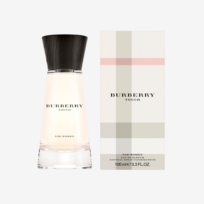 Burberry Touch for Women perfume bottle with soft curved design and delicate pink hue