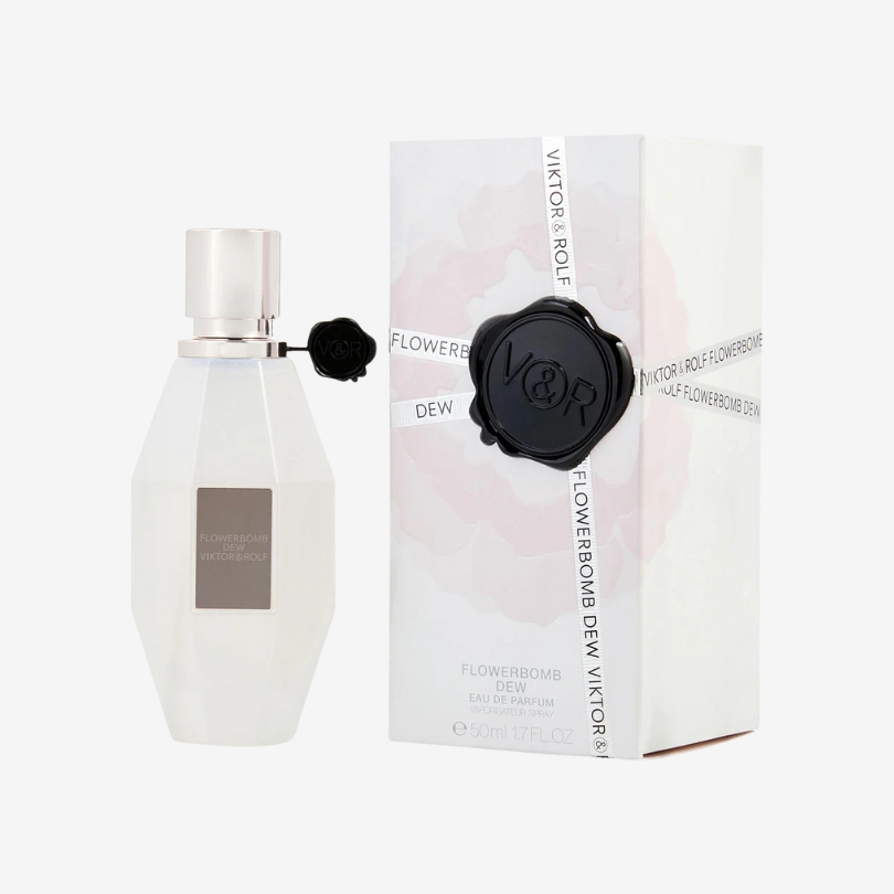 Flowerbomb Dew perfume bottle with frosted glass and soft pink liquid in elegant grenade design