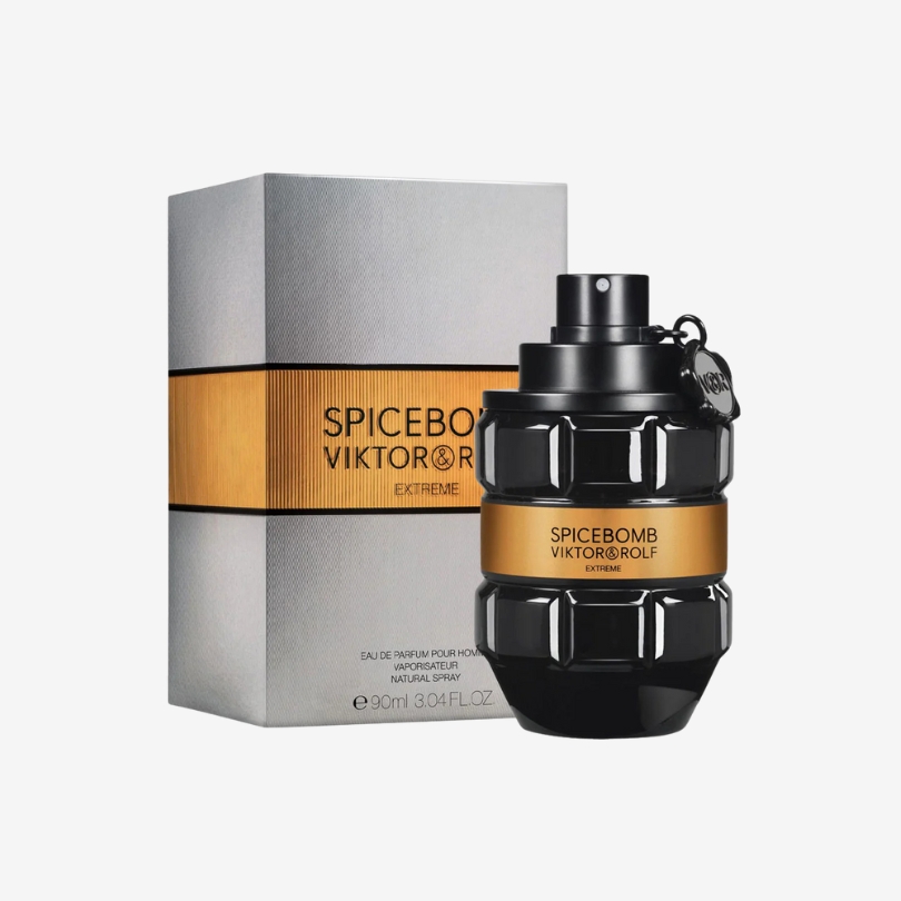 Spicebomb Extreme perfume bottle with matte black and bronze grenade design, bold and masculine