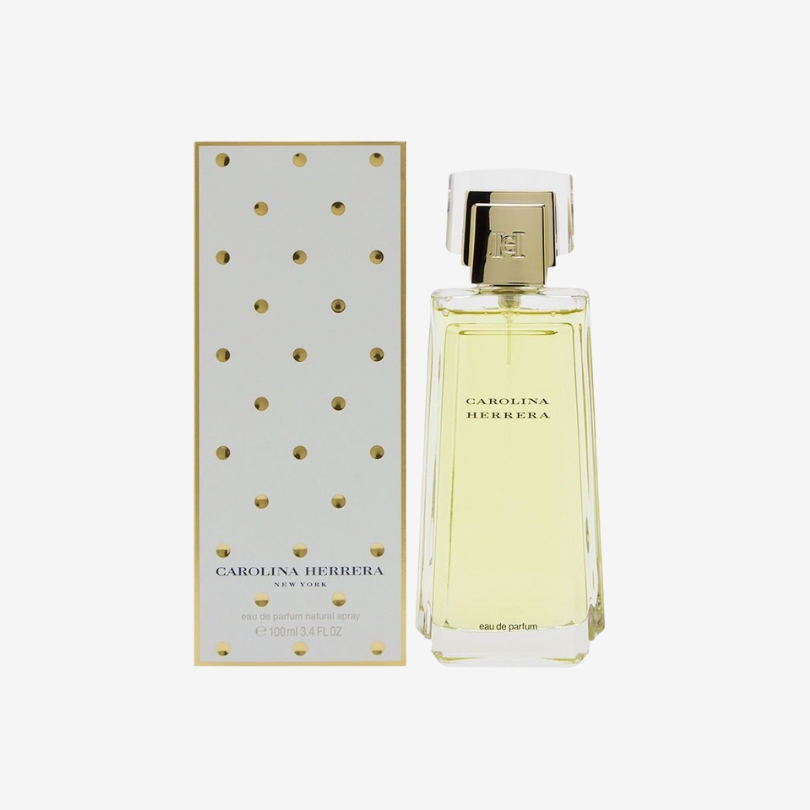 Carolina Herrera Eau de Parfum bottle with elegant transparent glass and gold cap design