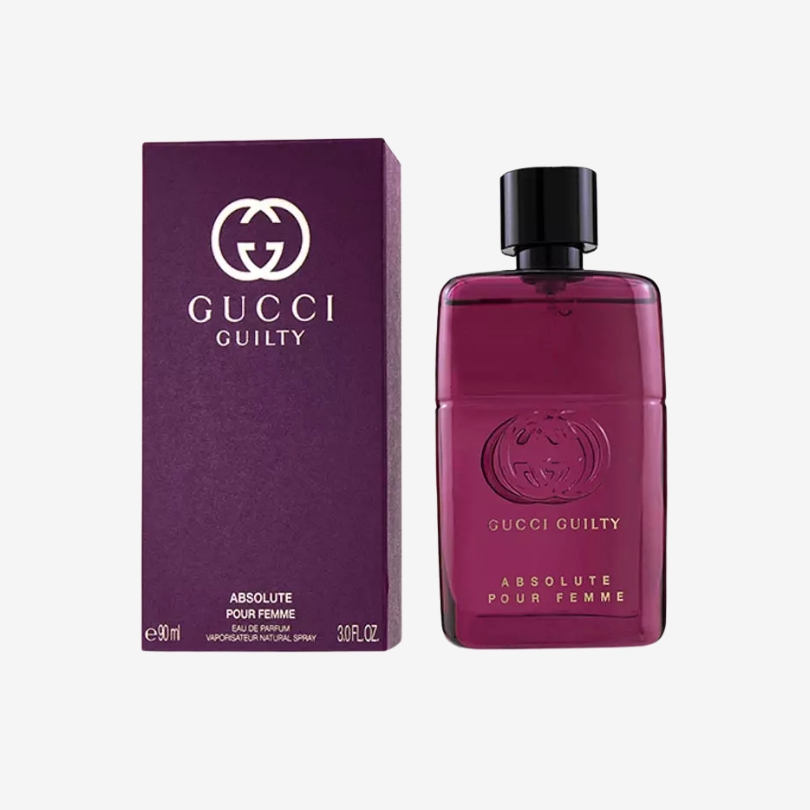 Gucci Guilty Absolute Pour Femme perfume bottle in rich burgundy glass with sleek gold cap and iconic design