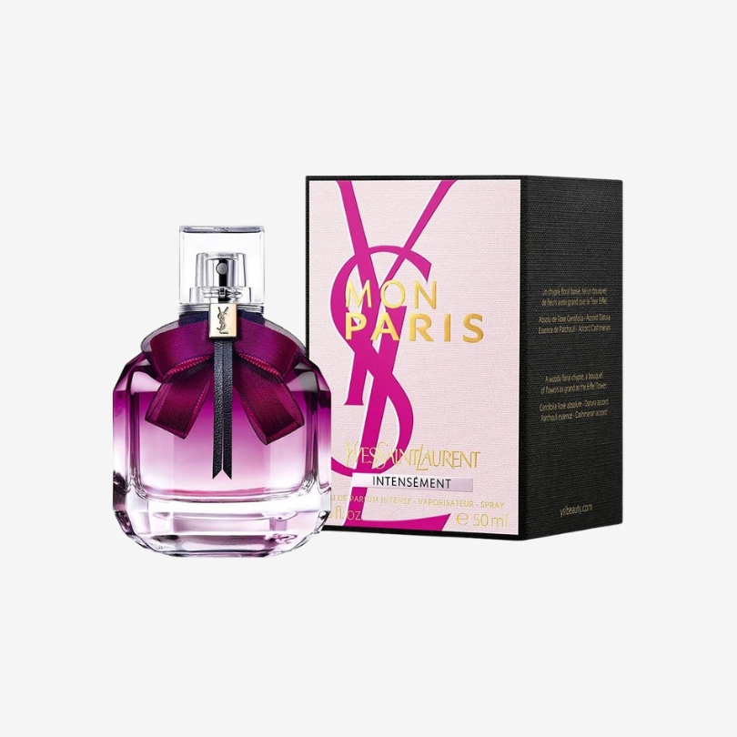 Mon Paris Intensément perfume bottle by YSL with vibrant fuchsia liquid and black velvet bow