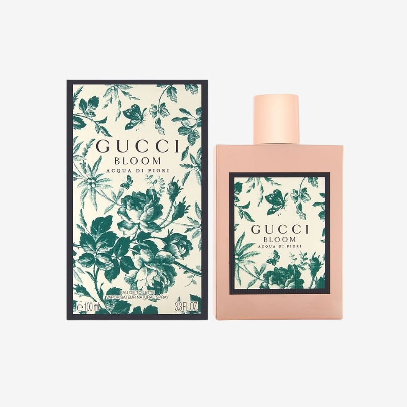 Gucci Bloom Acqua di Fiori perfume bottle in soft green with minimalist floral design