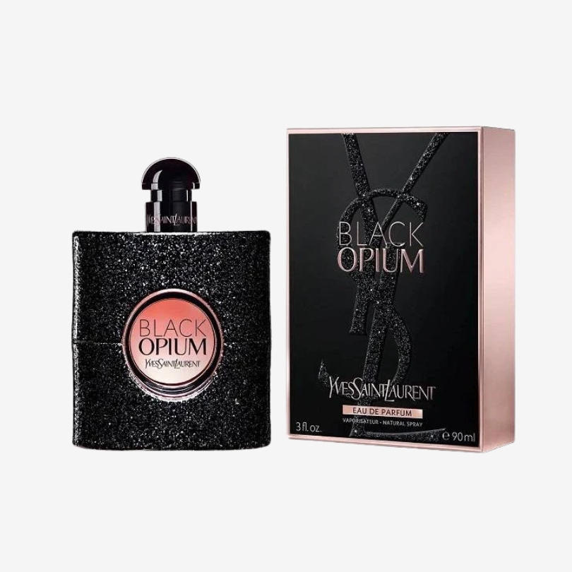Black Opium Eau de Parfum bottle by YSL with black glitter design and rose gold center